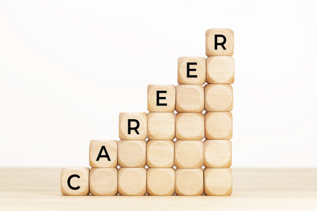 A stack of blocks forming a staircase with letters spelling out CAREER