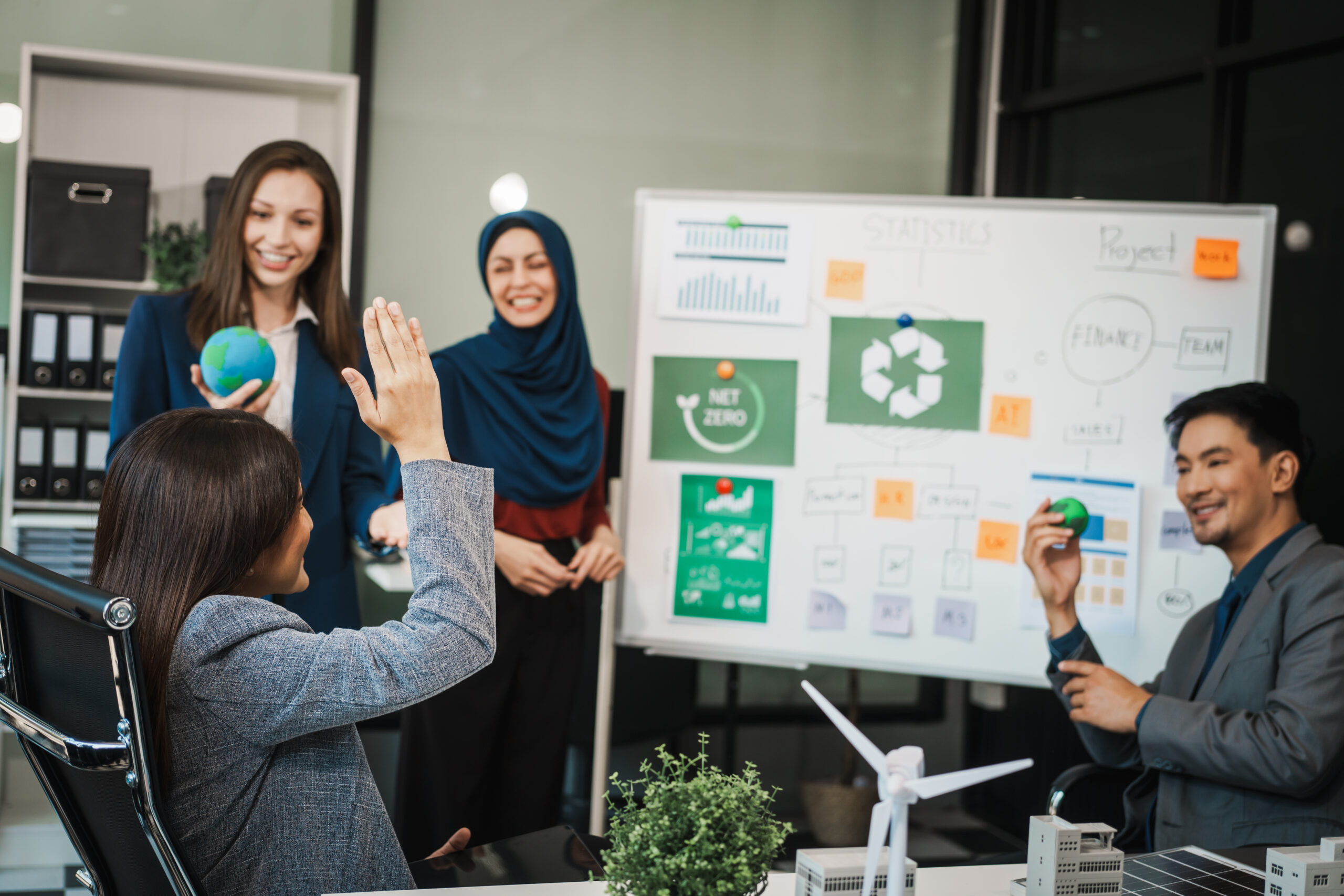 Professionals share ideas while planning a strategic brand awareness campaign.